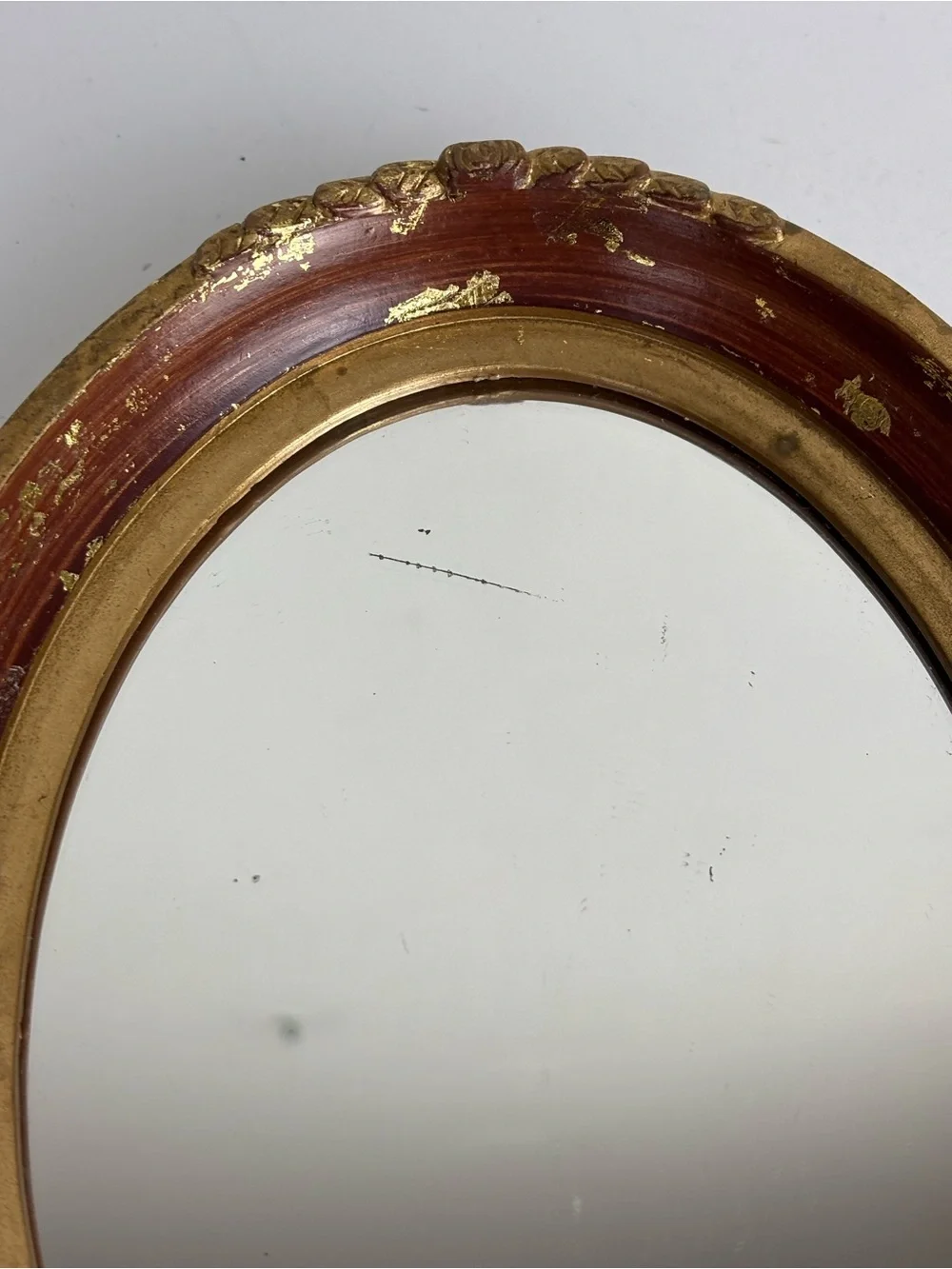 Small vintage oval wall mirror-gold /garnet red
